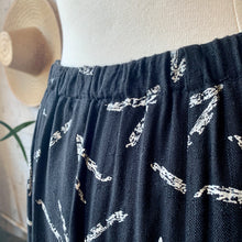 Load image into Gallery viewer, 1980s Black Linen Midi Skirt With White Abstract "V" Print