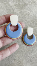 Load and play video in Gallery viewer, 80&#39;s White With Blue Stacked Rainbow Hoop Earrings

